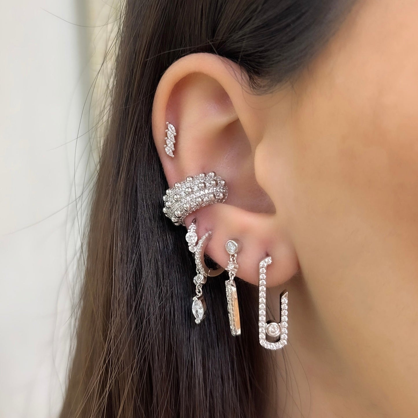 Piercing mit vier Marquise-Steinen