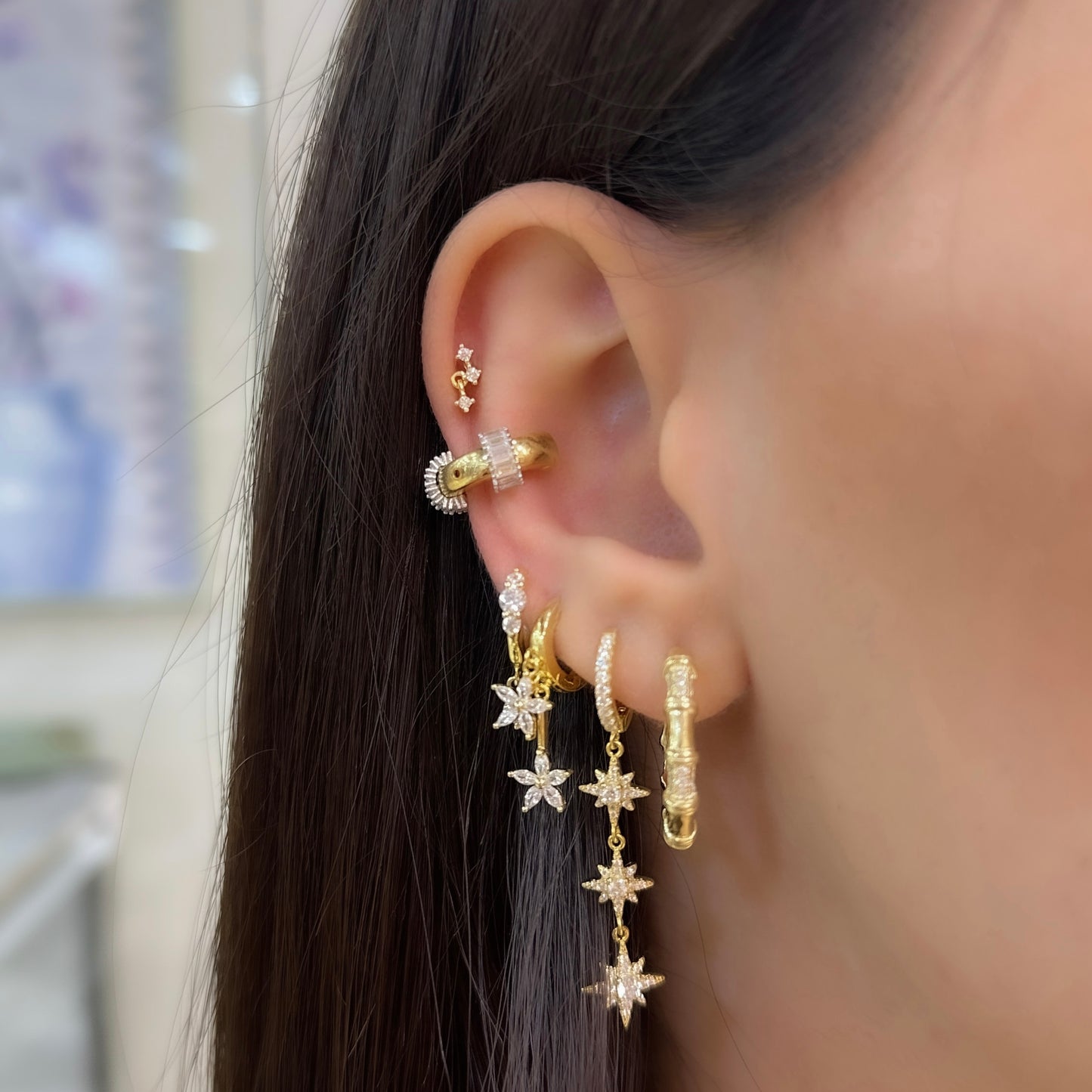 Piercing mit drei Steinen
