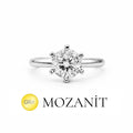 A Sub-Carat Claw Moissanite Solitaire Ring