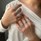Ring mit Austern-Baguette-Stein-Design