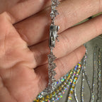 Halskette mit gelben Herzdetails