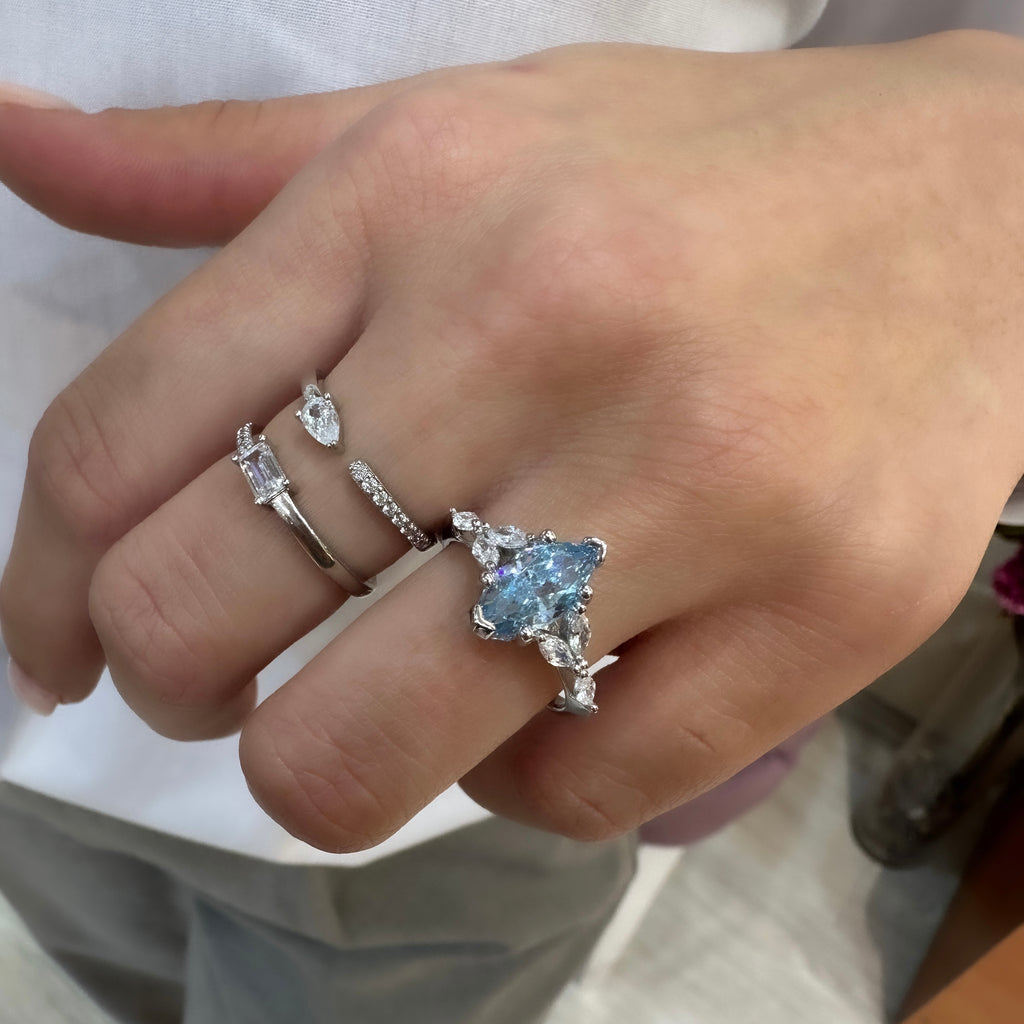 Ice Cut Side Marquise Stone Shuttle Ring