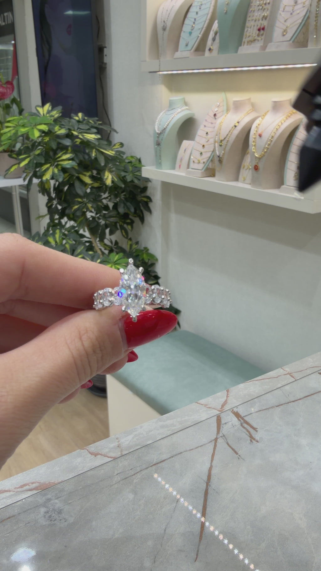 Marquise Moissanite Ring with Oval Stone Arm